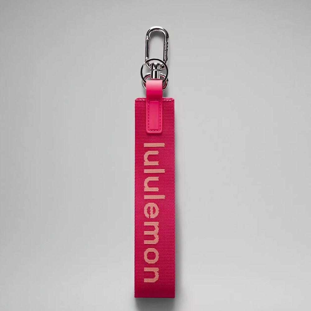 Lululemon NWT RASPBERRY Never lost Key chain